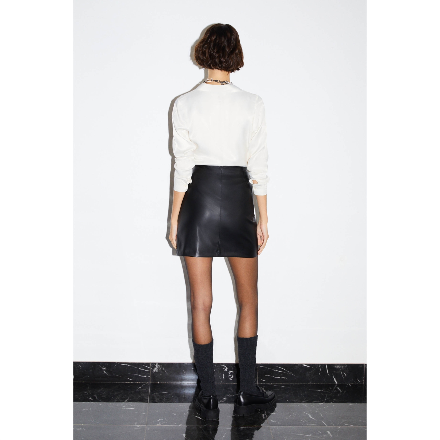 DERİ GÖRÜNÜMLÜ MİNİ ETEK