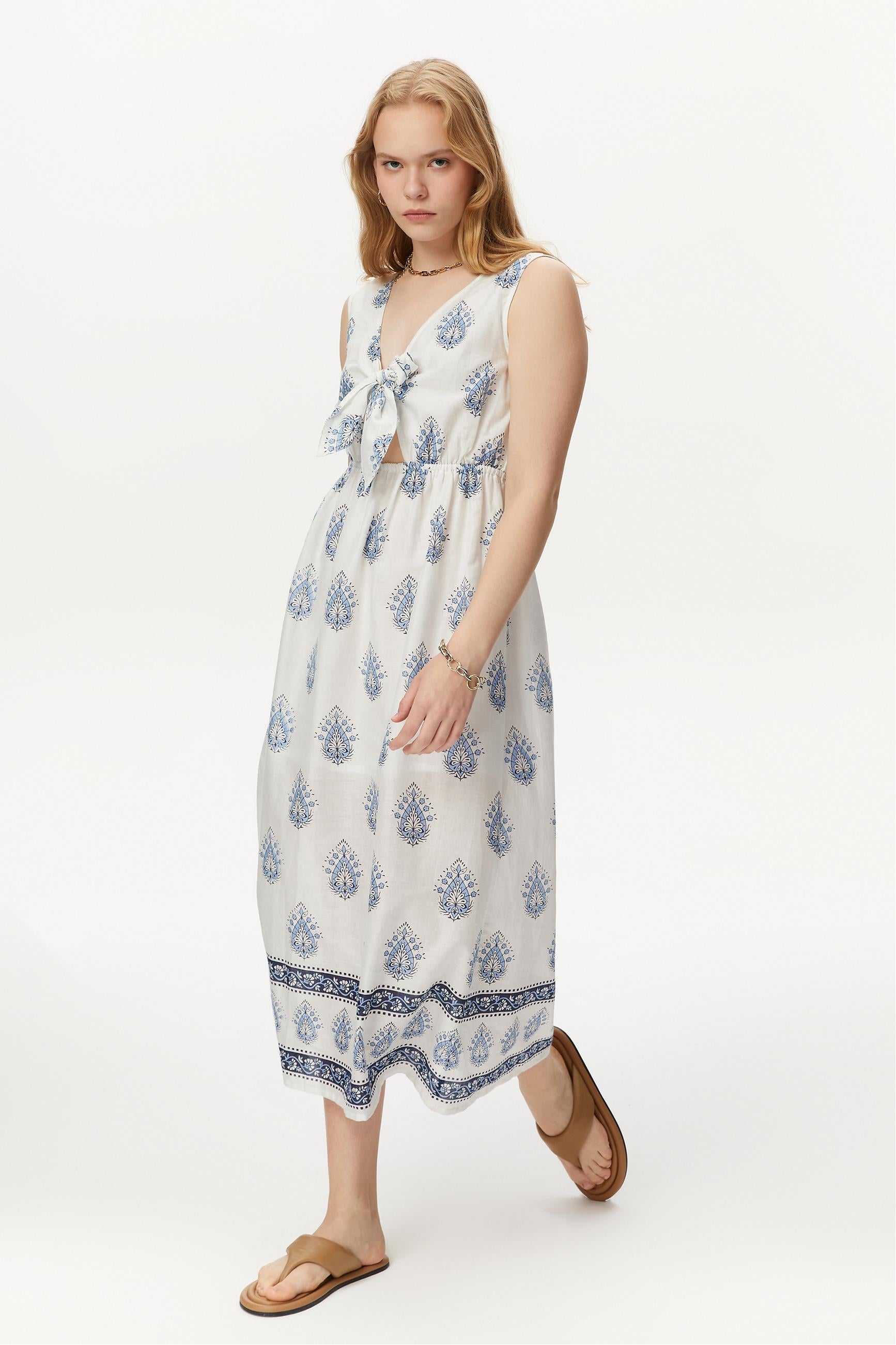 SIRT DETAYLI BASKILI UZUN ELBİSE