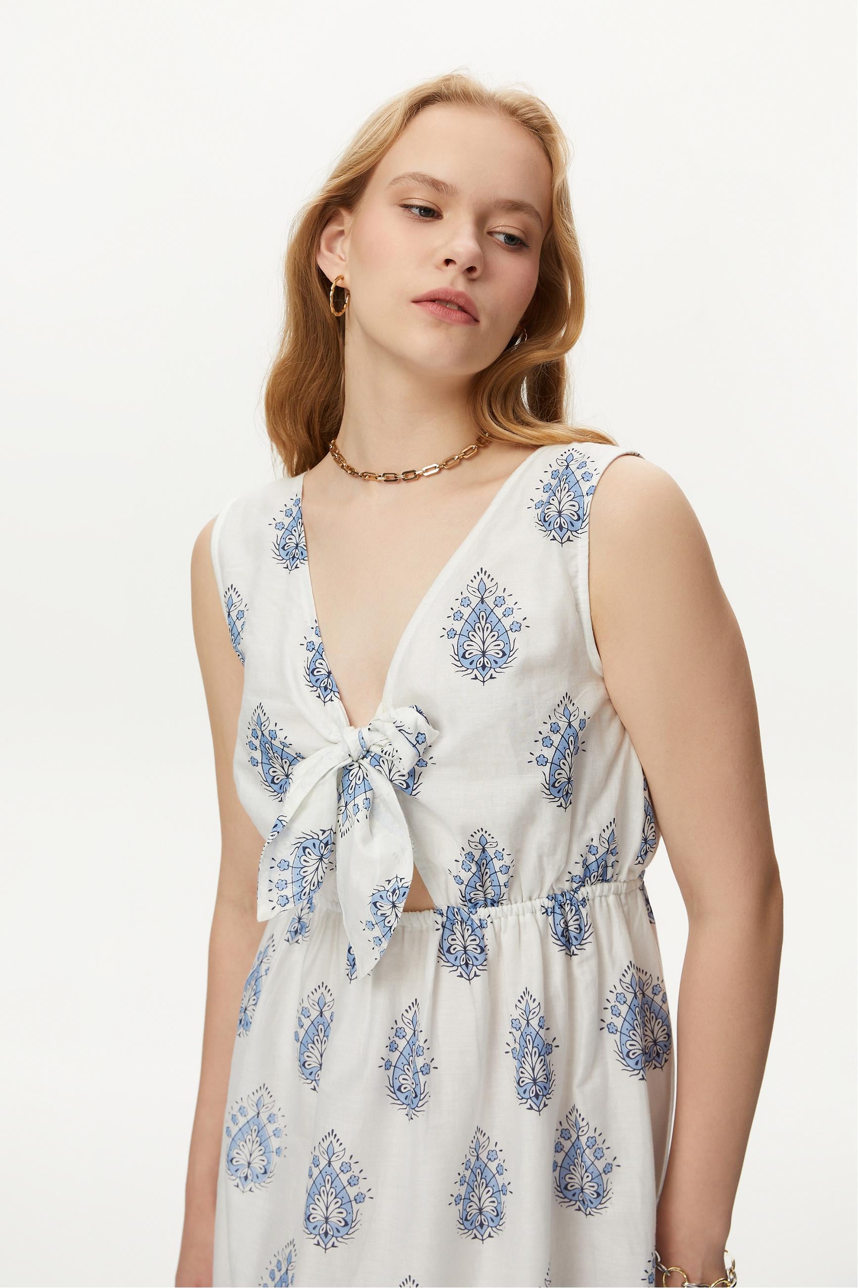 SIRT DETAYLI BASKILI UZUN ELBİSE