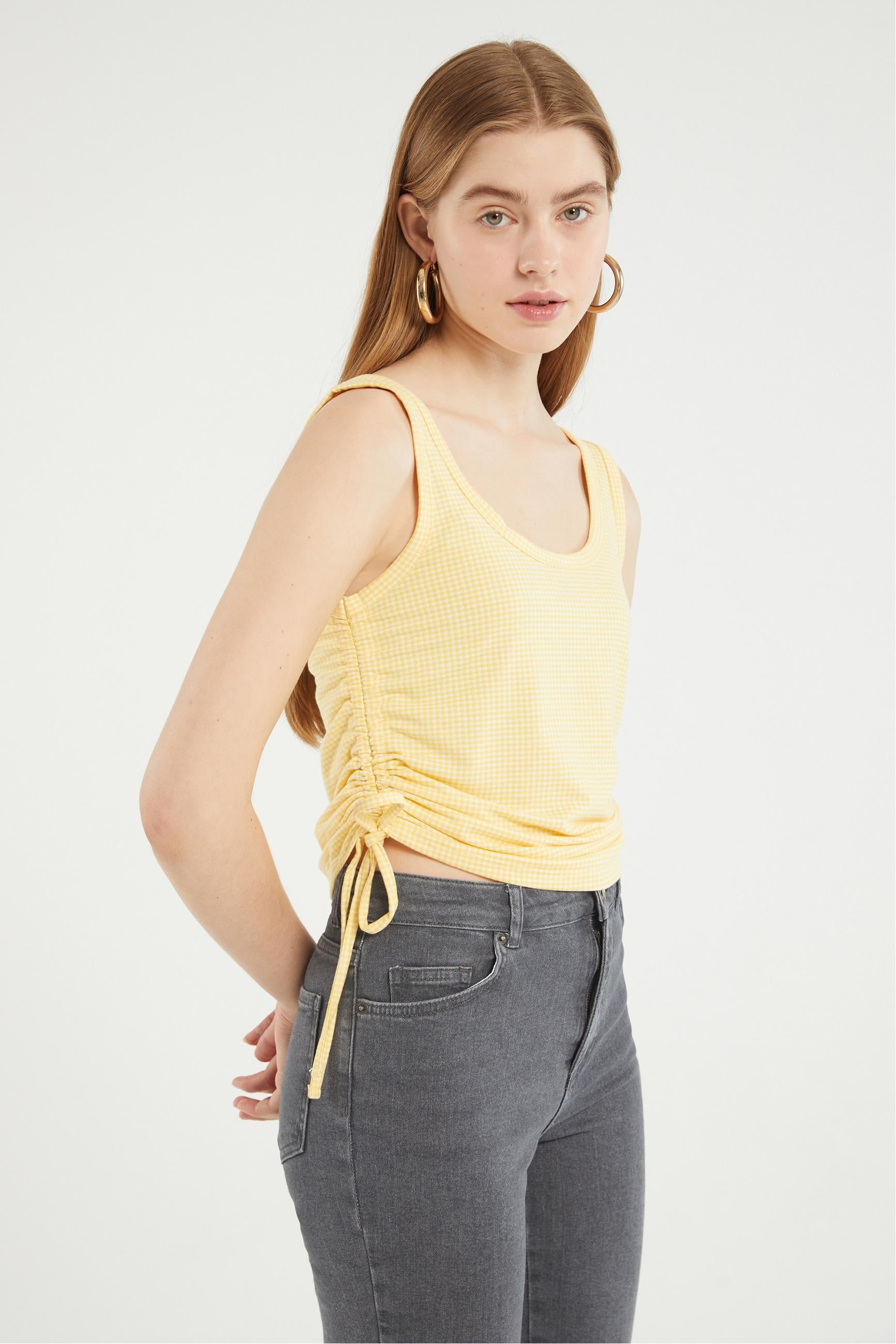 EKOSELİ KOLSUZ AYARLANABİLİR İPLİ BLUZ