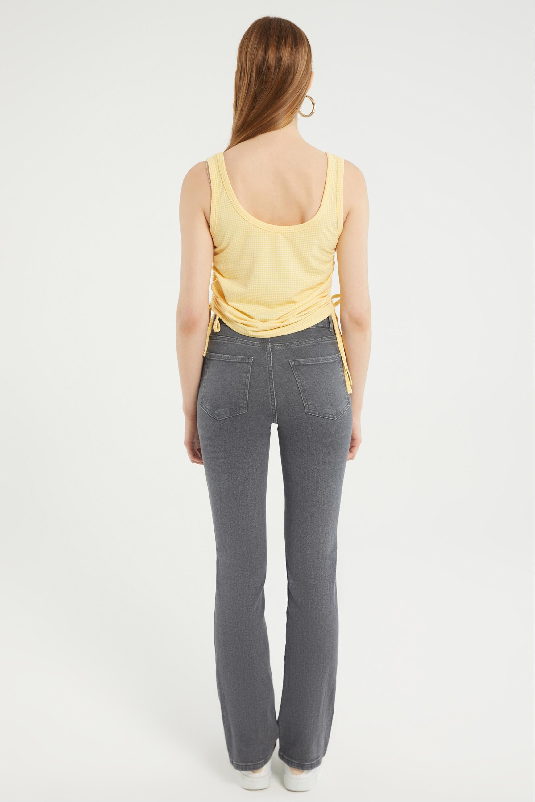 EKOSELİ KOLSUZ AYARLANABİLİR İPLİ BLUZ