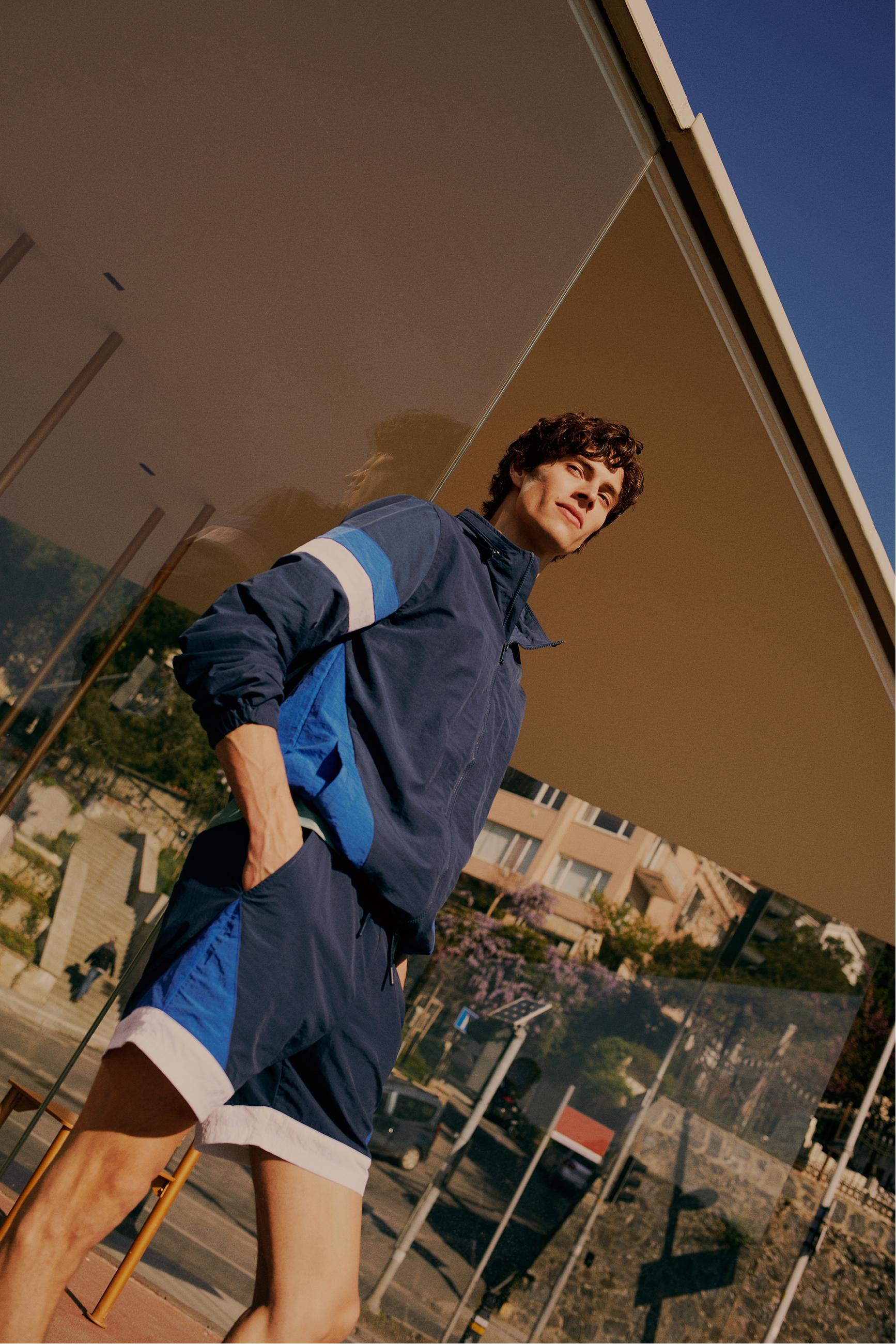 KAPÜŞONLU SU İTİCİ YAĞMURLUK