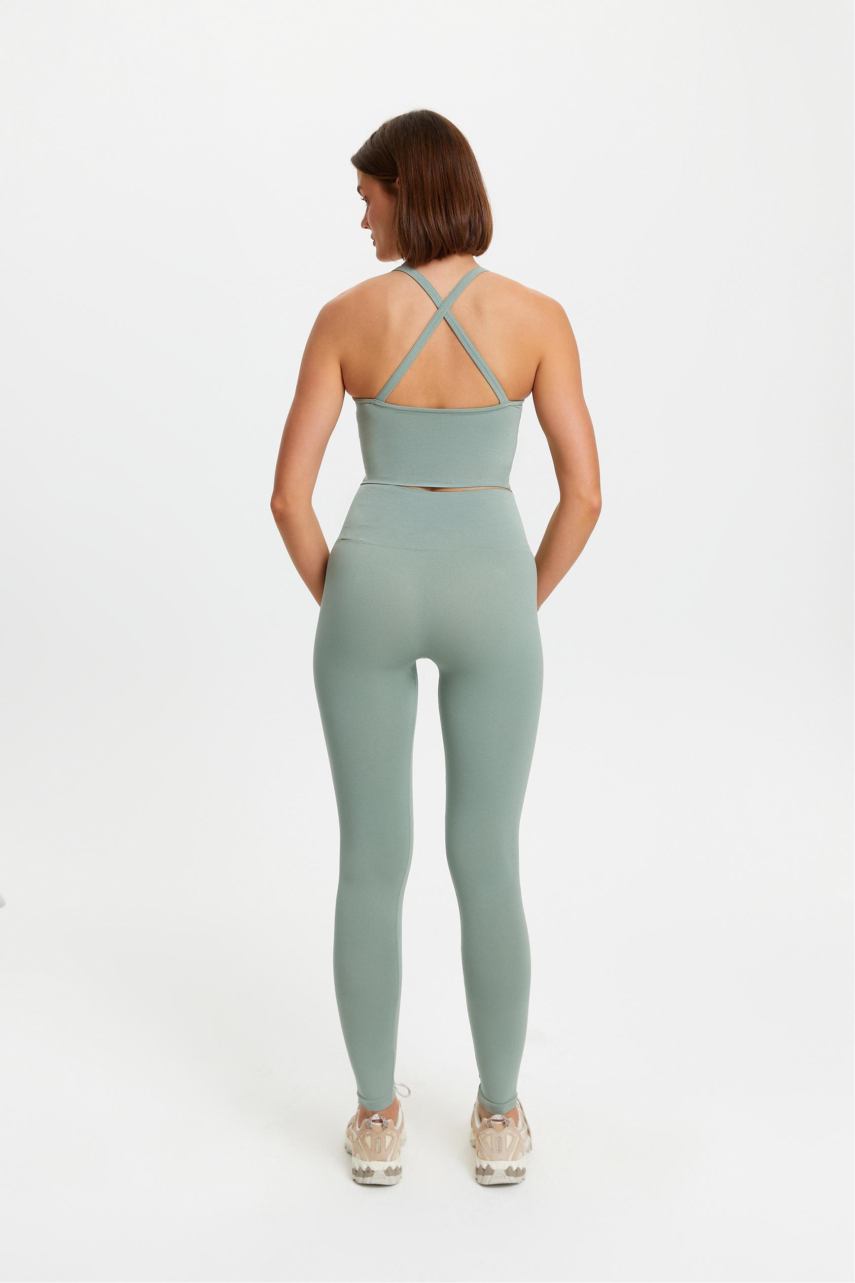 ÇAPRAZ SIRT DETAYLI FİTİLLİ CROP ATLET