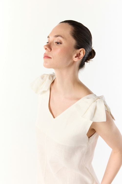  A KESİM CEPLİ KOLSUZ MİDİ ELBİSE