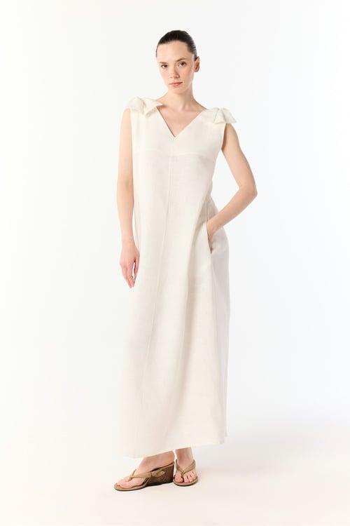  A KESİM CEPLİ KOLSUZ MİDİ ELBİSE