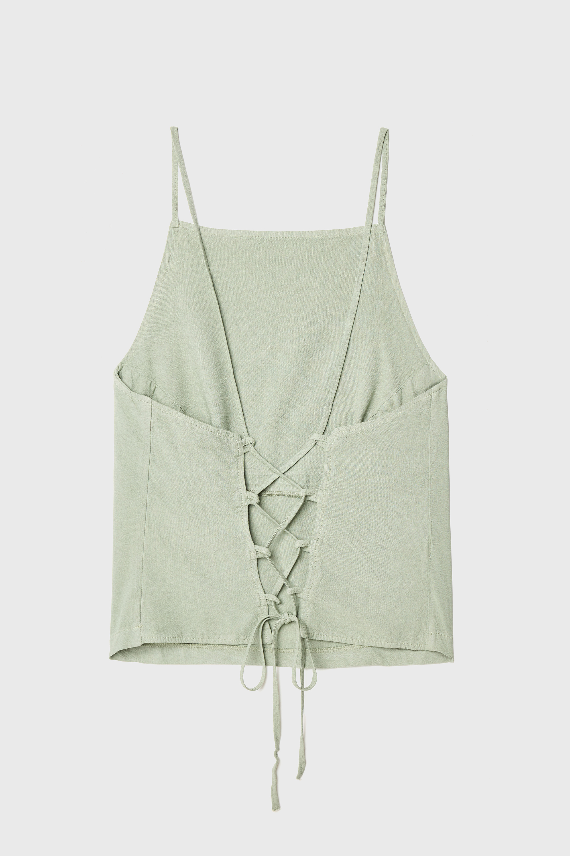 KOLSUZ SIRTI BAĞLAMA DETAYLI BLUZ