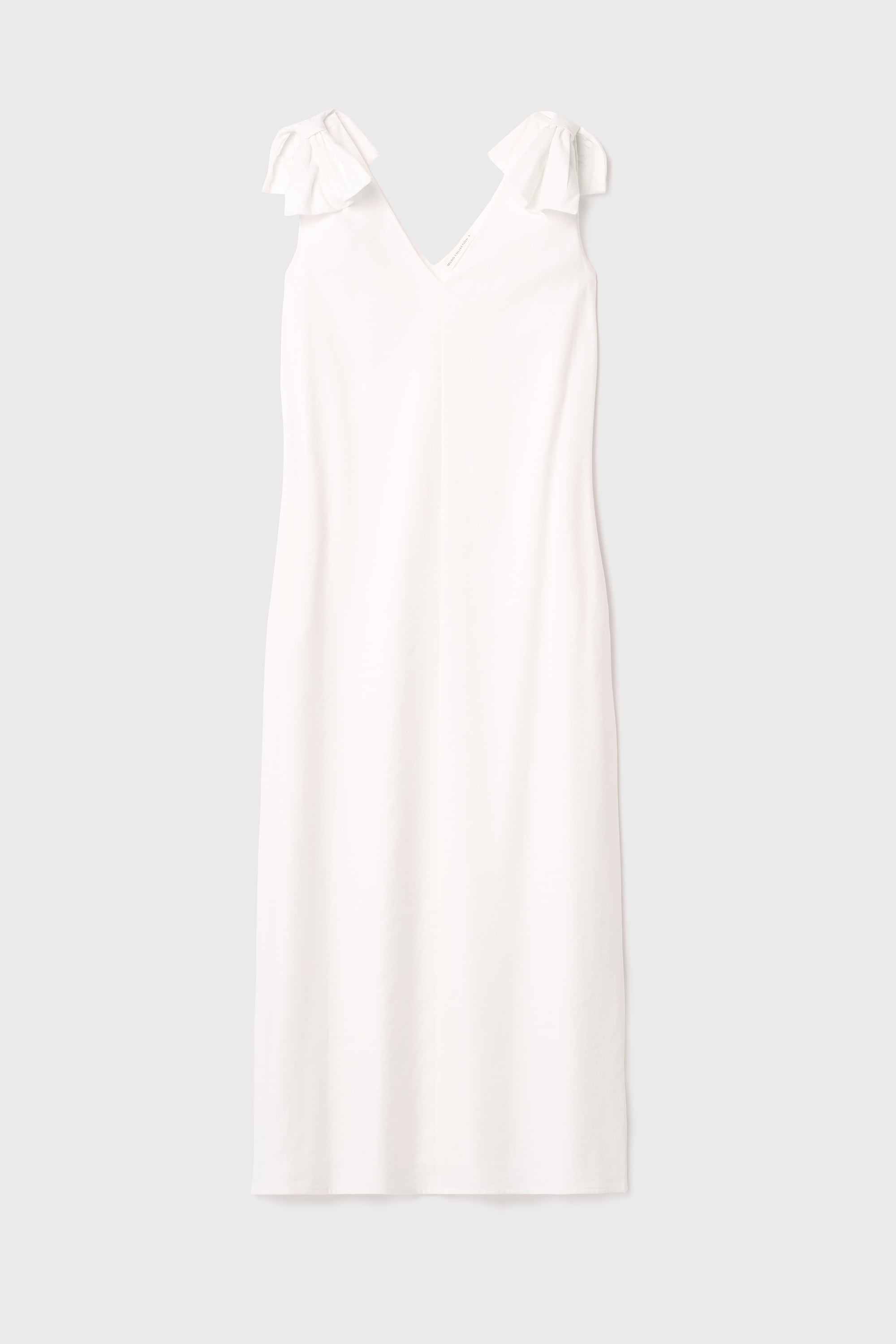 A KESİM CEPLİ KOLSUZ MİDİ ELBİSE