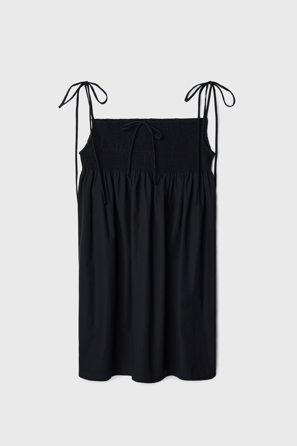 BÜZGÜ DETAYLI KLOŞ MİNİ ELBİSE