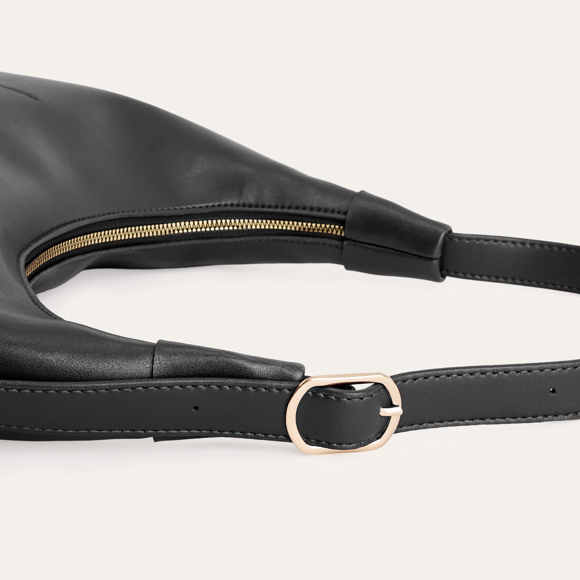 DERİ GÖRÜNÜMLÜ BAGET EL ÇANTASI