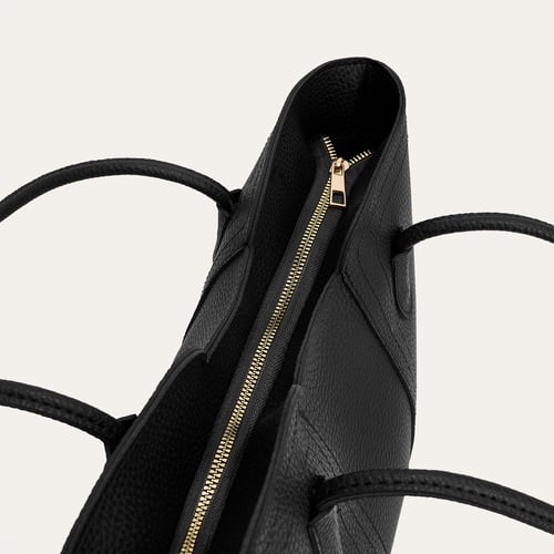 DİKİŞ DETAYLI DERİ GÖRÜNÜMLÜ EL ÇANTASI