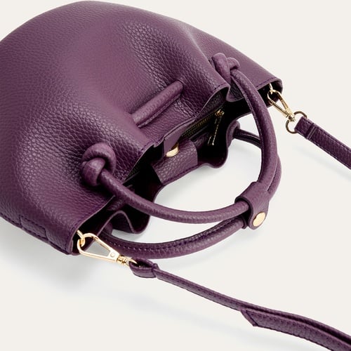 DERİ GÖRÜNÜMLÜ BÜZGÜLÜ KOL ÇANTASI