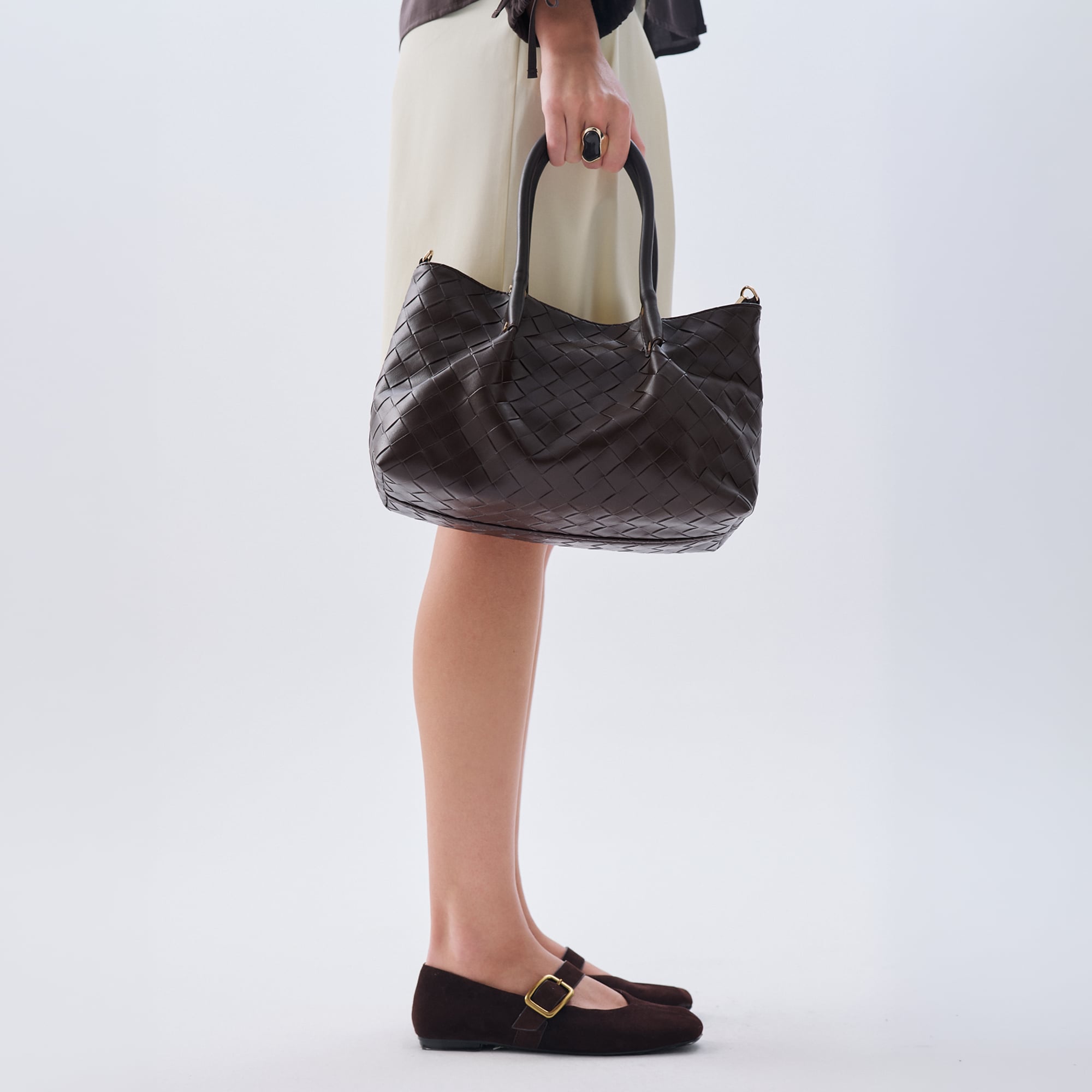 DERİ GÖRÜNÜMLÜ ÖRGÜLÜ EL ÇANTASI