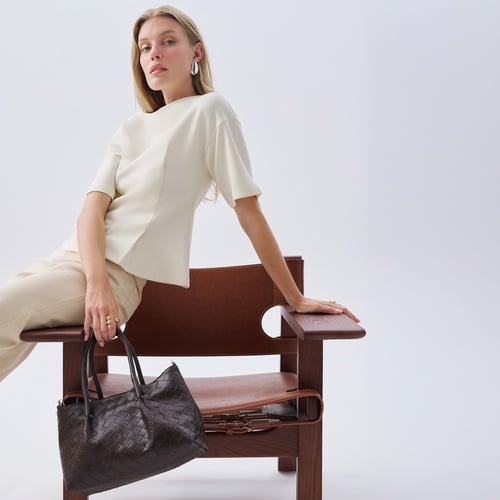 DERİ GÖRÜNÜMLÜ ÖRGÜLÜ EL ÇANTASI