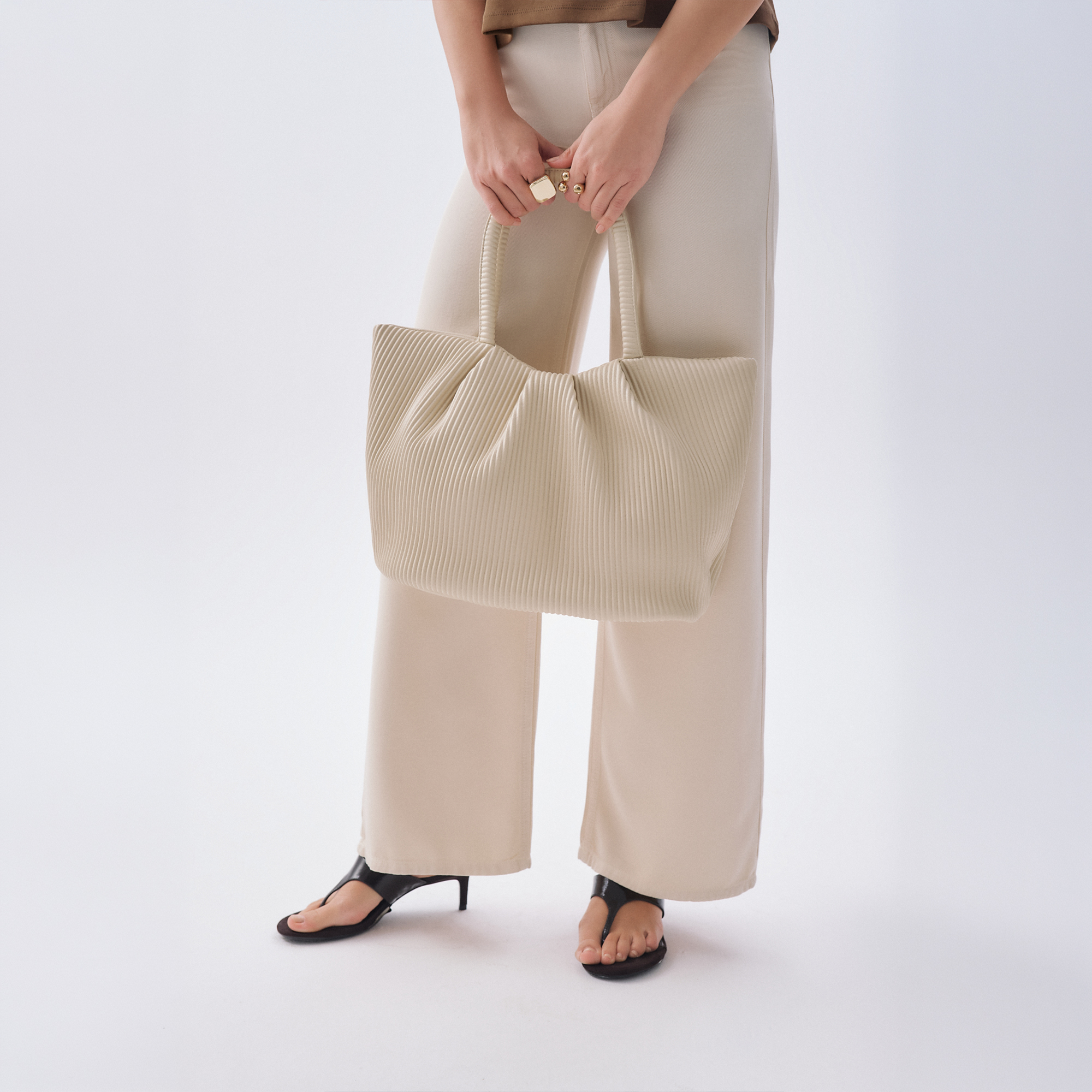 FİTİLLİ DERİ GÖRÜNÜMLÜ EL ÇANTASI